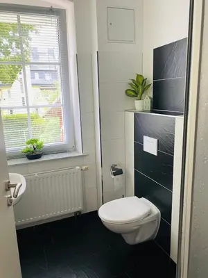 Ein Badezimmer in der Unterkunft FEWO Edisonstraße