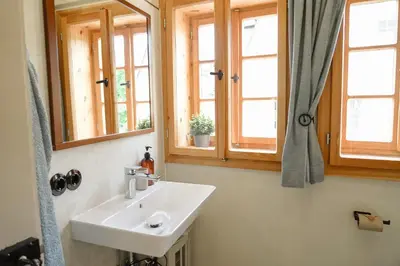 Ein Badezimmer in der Unterkunft Urlaubsfreude Biedermann Haus Blumenglück - Vergissmeinnicht