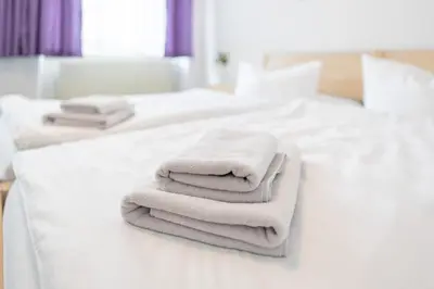Ein Bett oder Betten in einem Zimmer der Unterkunft Hotel Bavaria