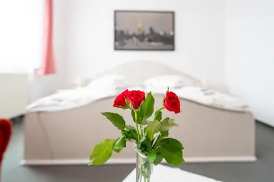 Ein Bett oder Betten in einem Zimmer der Unterkunft Hotel Bavaria