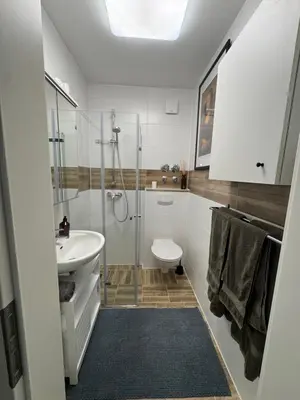 Ein Badezimmer in der Unterkunft ToKa Appartement