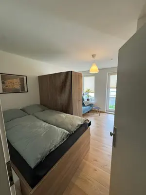 Ein Bett oder Betten in einem Zimmer der Unterkunft ToKa Appartement