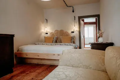 Ein Bett oder Betten in einem Zimmer der Unterkunft Urlaubsfreude Biedermann Haus Blumenglück - Gänseblümchen