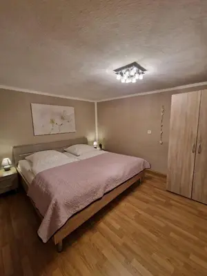 Ein Bett oder Betten in einem Zimmer der Unterkunft Ferienwohnung Helma Richter