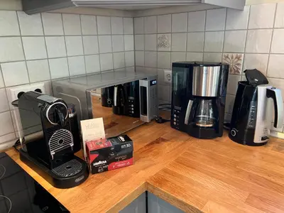 Kaffee-/Teezubehör in der Unterkunft Charmantes Hinterhaus mit Terrasse - zentrale Lage