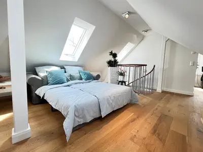 Ein Bett oder Betten in einem Zimmer der Unterkunft Charmantes Hinterhaus mit Terrasse - zentrale Lage