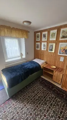 Ein Bett oder Betten in einem Zimmer der Unterkunft Ferienwohnung Dresden - Altlockwitz