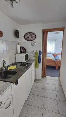 Küche/Küchenzeile in der Unterkunft Ferienwohnung Dresden - Altlockwitz