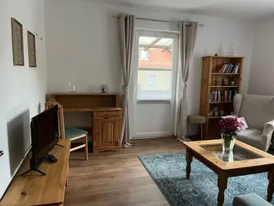 Ein Sitzbereich in der Unterkunft Ferienwohnung an der Rosenstraße