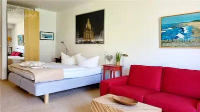 Ein Bett oder Betten in einem Zimmer der Unterkunft Appartement im Herzen Dresdens