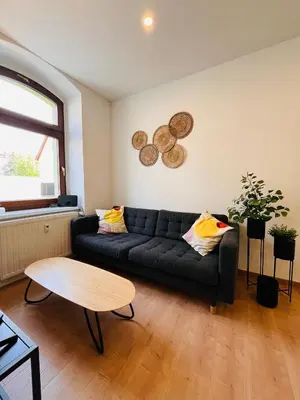 Ein Sitzbereich in der Unterkunft Makro Apartment Großenhain
