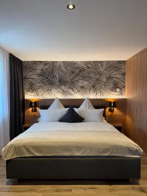 Ein Bett oder Betten in einem Zimmer der Unterkunft Ferienhaus #4 Gamrig