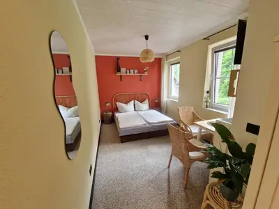 Ein Bett oder Betten in einem Zimmer der Unterkunft Ferienwohnung Anna