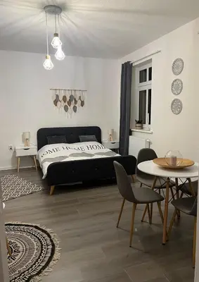 Ein Bett oder Betten in einem Zimmer der Unterkunft ElbStadtFlair Apartment