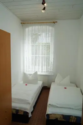 Ein Bett oder Betten in einem Zimmer der Unterkunft Villa Angelika