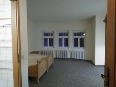 Ein Bett oder Betten in einem Zimmer der Unterkunft Schloss Friedrichstal Arabi-Ka
