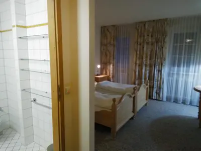 Ein Bett oder Betten in einem Zimmer der Unterkunft Schloss Friedrichstal Arabi-Ka