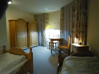Ein Bett oder Betten in einem Zimmer der Unterkunft Schloss Friedrichstal Arabi-Ka