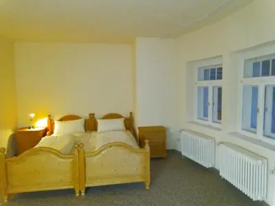 Ein Bett oder Betten in einem Zimmer der Unterkunft Schloss Friedrichstal Arabi-Ka