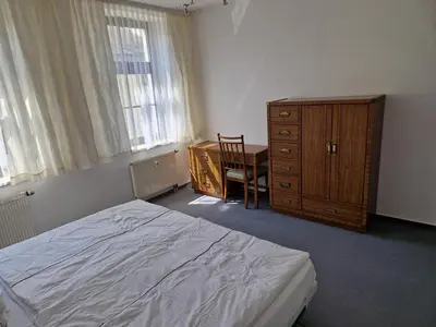 Ein Bett oder Betten in einem Zimmer der Unterkunft Gästezimmer North Carolina in Chemnitz