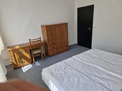 Ein Bett oder Betten in einem Zimmer der Unterkunft Gästezimmer North Carolina in Chemnitz