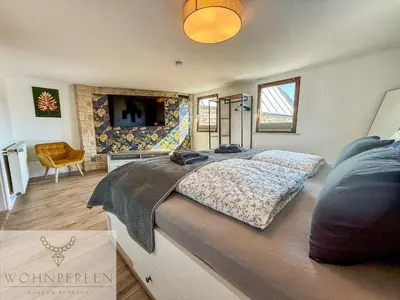 Ein Bett oder Betten in einem Zimmer der Unterkunft Wohnperle Bauernhaus Meusegast