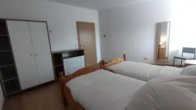 Ein Bett oder Betten in einem Zimmer der Unterkunft MuNo-Apartment