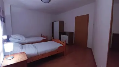 Ein Bett oder Betten in einem Zimmer der Unterkunft MuNo-Apartment