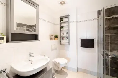 Ein Badezimmer in der Unterkunft Gemütliche barrierefreie Dachgeschosswohnung