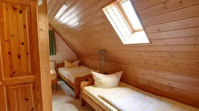 Ein Bett oder Betten in einem Zimmer der Unterkunft Haus Heidi, Wellness und Ayurveda
