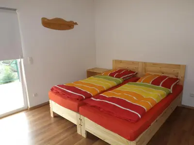 Ein Bett oder Betten in einem Zimmer der Unterkunft Pension Rego