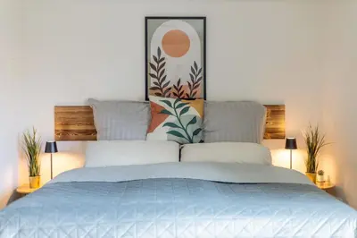 Ein Bett oder Betten in einem Zimmer der Unterkunft Großes Studio in Altstadt - Uni & Schloss zu Fuß erreichen