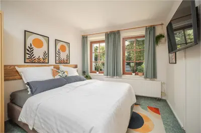 Ein Bett oder Betten in einem Zimmer der Unterkunft Gemütliches Studio in Altstadt - mit Sofa und Kochgelegenheit