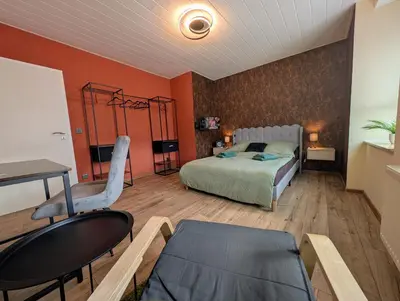 Ein Bett oder Betten in einem Zimmer der Unterkunft Komfortzimmer Waldheim