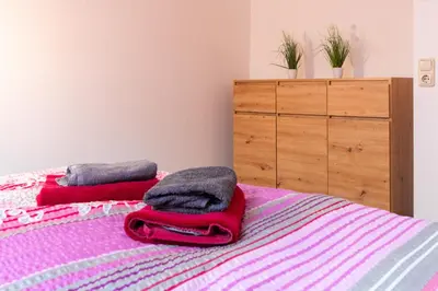 Ein Bett oder Betten in einem Zimmer der Unterkunft Ferienwohnung Cordula