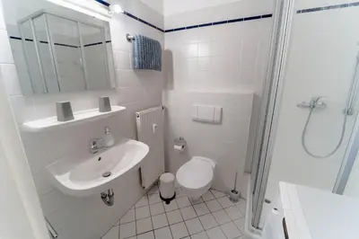 Ein Badezimmer in der Unterkunft Beautiful old building apartment