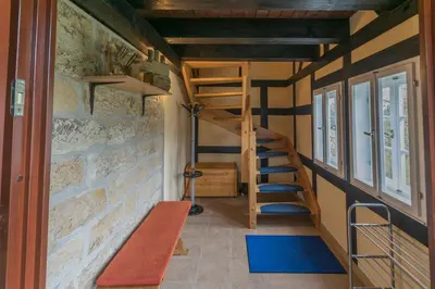 Ein Etagenbett oder Etagenbetten in einem Zimmer der Unterkunft Ferienhaus Herta ein charmant, saniertes Einzeldenkmal im Elbsandsteingebirge -Nähe Bad Schandau