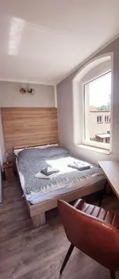 Ein Bett oder Betten in einem Zimmer der Unterkunft Ferienwohnung Lessing