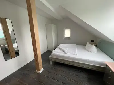 Ein Bett oder Betten in einem Zimmer der Unterkunft Avenue Apartment - Klarastraße