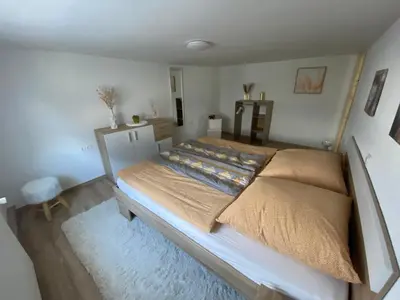 Ein Bett oder Betten in einem Zimmer der Unterkunft Ferienwohnung Fiss Dorfhain