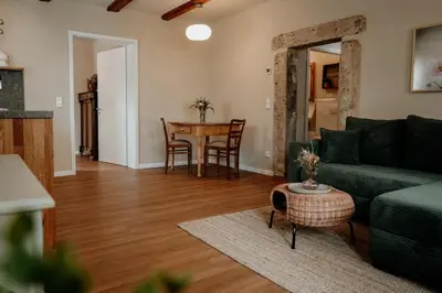 Ein Sitzbereich in der Unterkunft Urlaubsfreude Biedermann Haus Blumenglück - Anemone