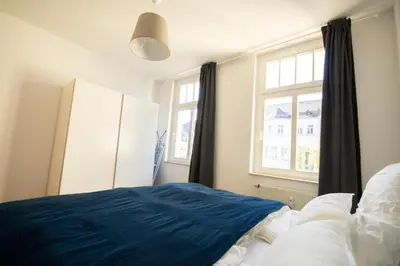 Ein Bett oder Betten in einem Zimmer der Unterkunft Auf dem Kassberg - Walter 3OG mit Aufzug, WLAN, Netflix und mehr