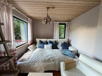 Ein Bett oder Betten in einem Zimmer der Unterkunft Waldhaus im Erzgebirge