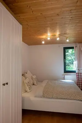 Ein Bett oder Betten in einem Zimmer der Unterkunft Waldhaus im Erzgebirge