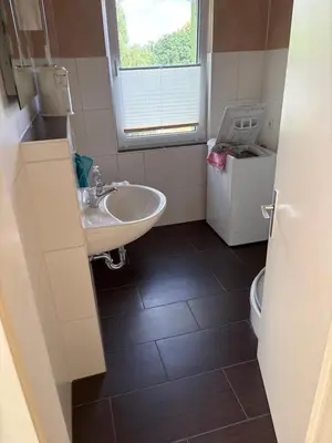 Ein Badezimmer in der Unterkunft Ferienhaus Schwope 04654 Frohburg OT Kohren-Sahlis Friedensstraße 33