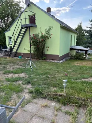 Ein Garten an der Unterkunft Ferienhaus Schwope 04654 Frohburg OT Kohren-Sahlis Friedensstraße 33