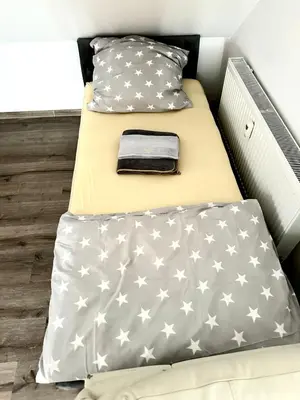 Ein Bett oder Betten in einem Zimmer der Unterkunft Pension Jasmin B