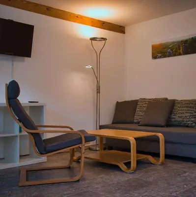 Ein Sitzbereich in der Unterkunft Ferienhaus Gipfelblick im Sandsteinidyll