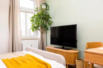 TV/Unterhaltungsangebot in der Unterkunft StayTime - Cedar Room