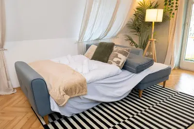 Ein Bett oder Betten in einem Zimmer der Unterkunft StayTime - Nordic Loft